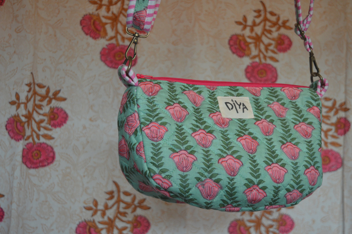 Green Crossbody Bag with Pink Floral Motif