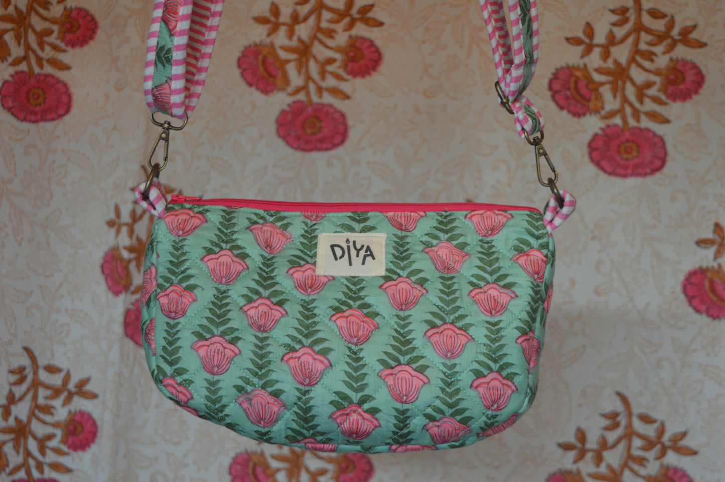 Green Crossbody Bag with Pink Floral Motif